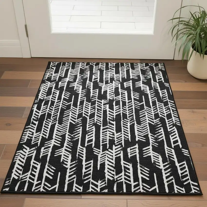 Black And Ivory Tribal Washable Area Rug With UV Protection Photo 2