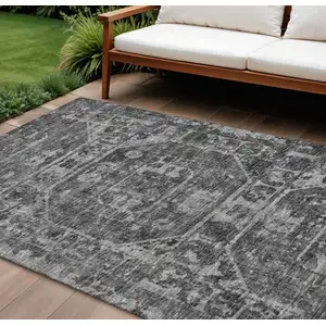 Photo of Black And Ivory Tribal Washable Indoor Outdoor Area Rug