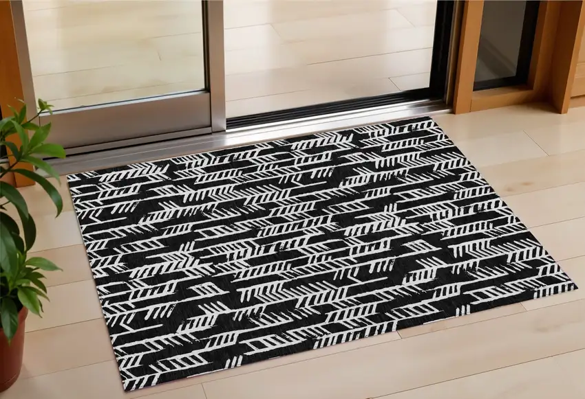 Black And Ivory Tribal Washable Indoor Outdoor Area Rug Photo 1