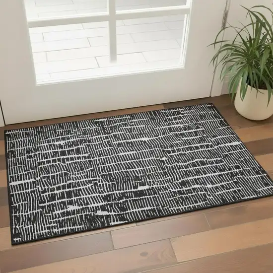 Black And Ivory Vermicular Washable Area Rug With UV Protection Photo 1