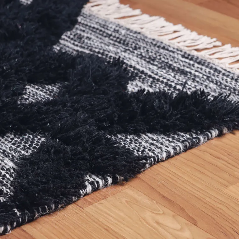 Black And Ivory Wool Geometric Flatweave Handmade Stain Resistant Area Rug With Fringe Photo 4