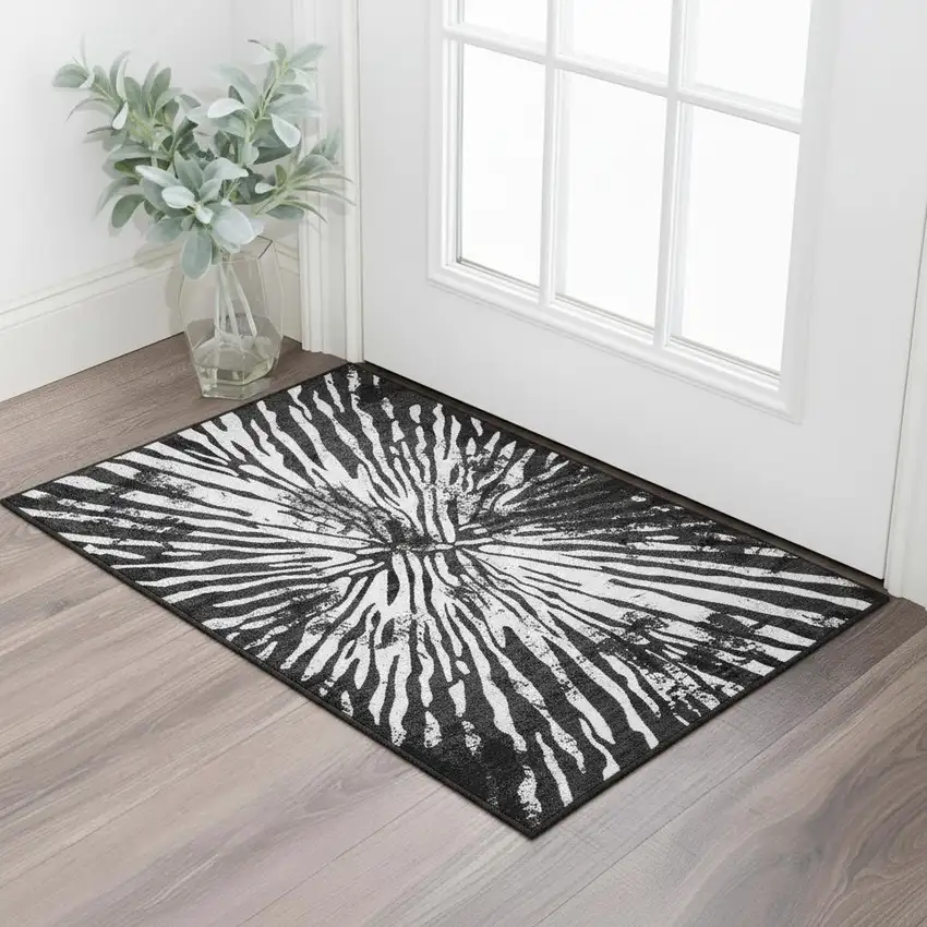 Black And Ivory Zebra Print Washable Area Rug With UV Protection Photo 1