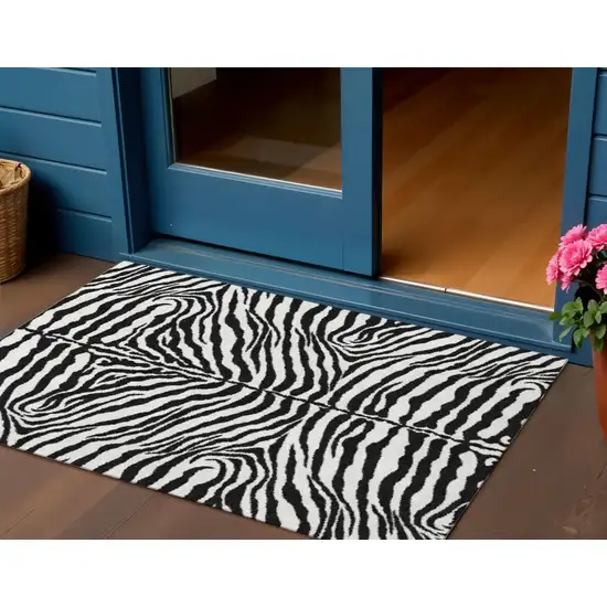 Black And Ivory Zebra Print Washable Indoor Outdoor Area Rug Photo 1