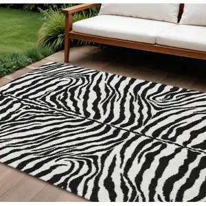 Photo of Black And Ivory Zebra Print Washable Indoor Outdoor Area Rug