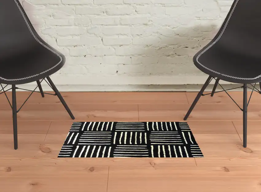 Black And Off White Abstract Machine Washable Area Rug With UV Protection Photo 2