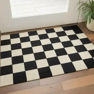 Photo of Black And Off White Checkered Washable Area Rug With UV Protection