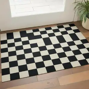 Photo of Black And Off White Checkered Washable Area Rug With UV Protection