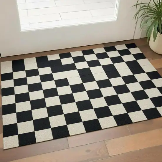Black And Off White Checkered Washable Area Rug With UV Protection Photo 1
