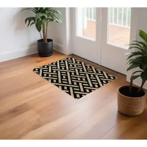Photo of Black And Off White Checkered Washable Area Rug With UV Protection