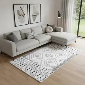 Photo of Black And Off White Geometric Area Rug