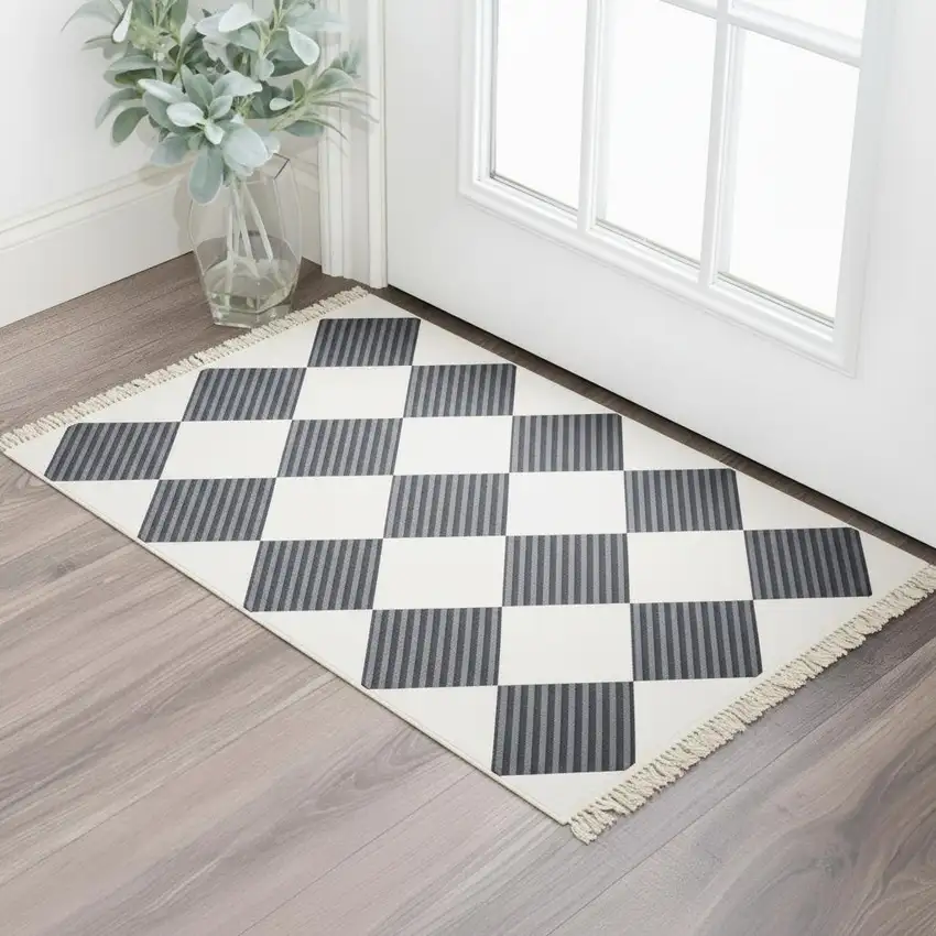 Black And Off White Geometric Washable Area Rug With Fringe Photo 1
