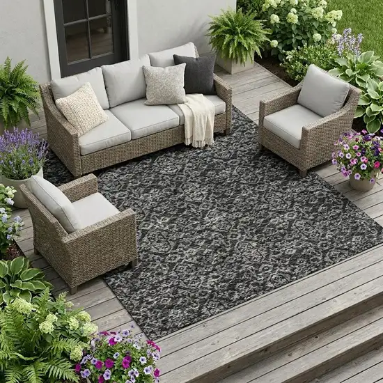 Black And Saffron Oriental Washable Indoor Outdoor Area Rug Photo 1