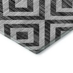 Photo of Black And Silver Geometric Washable Area Rug With UV Protection