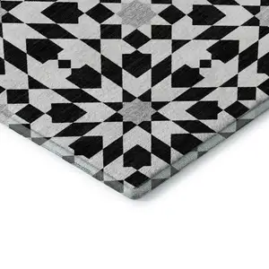 Photo of Black And Silver Geometric Washable Area Rug With UV Protection