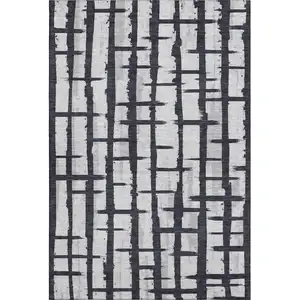 Photo of Black And Silver Striped Washable Area Rug With UV Protection