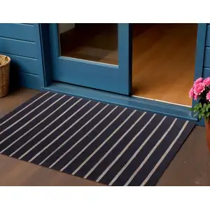 Photo of Black And Tan Striped Hand Woven Square Rug