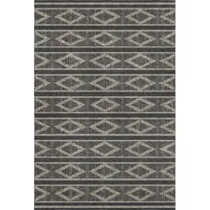 Photo of Black And Taupe Geometric Washable Area Rug With UV Protection
