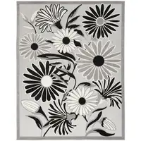 Photo of Black And White Floral Stain Resistant Non Skid Area Rug