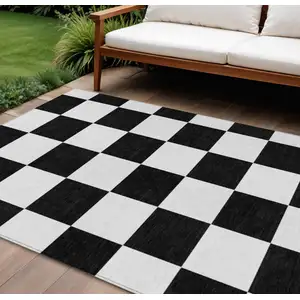 Photo of Black And White Geometric Washable Indoor Outdoor Area Rug