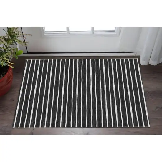 Black And White Modern Stripe Printed Vinyl Area Rug with UV Protection Photo 1