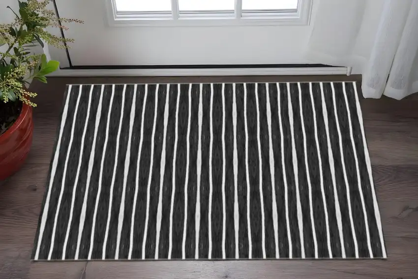 Black And White Modern Stripe Printed Vinyl Area Rug with UV Protection Photo 1