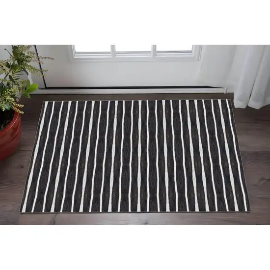 Black And White Modern Stripe Printed Vinyl Area Rug with UV Protection Photo 1