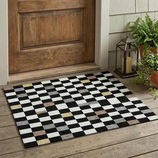 Black And Yellow Geometric Washable Indoor Outdoor Area Rug Photo 1