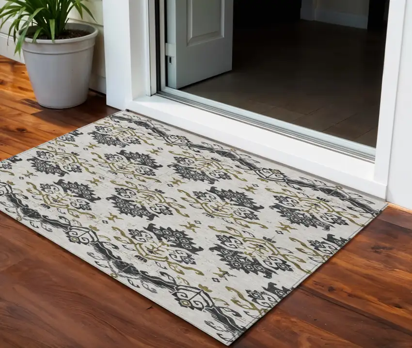 Black Beige And Gold Oriental Washable Indoor Outdoor Area Rug Photo 1