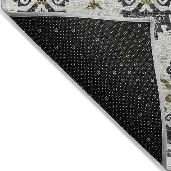 Black Beige And Gold Oriental Washable Indoor Outdoor Area Rug Photo 3