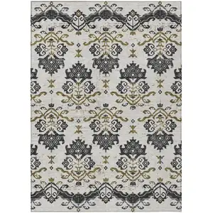 Photo of Black Beige And Gold Oriental Washable Indoor Outdoor Area Rug