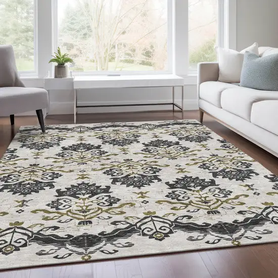 Black Beige And Gold Oriental Washable Indoor Outdoor Area Rug Photo 7