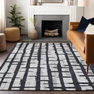 Photo of Black Beige And Gray Striped Washable Indoor Outdoor Area Rug