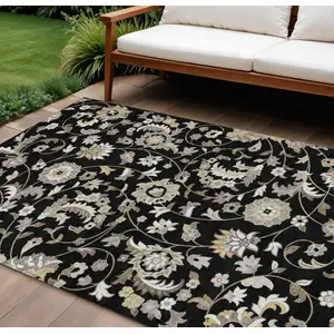 Photo of Black Beige And Ivory Floral Washable Indoor Outdoor Area Rug