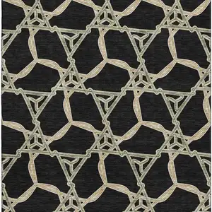 Photo of Black Beige And Ivory Geometric Washable Area Rug With UV Protection