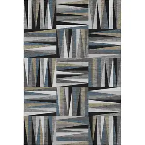 Photo of Black Beige And Ivory Geometric Washable Area Rug With UV Protection
