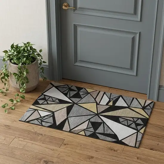 Black Beige And Ivory Geometric Washable Area Rug With UV Protection Photo 1
