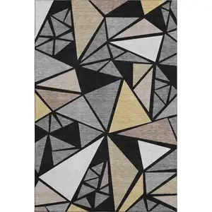 Photo of Black Beige And Ivory Geometric Washable Area Rug With UV Protection