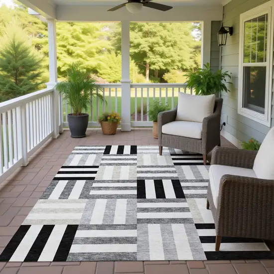 Black Beige And Ivory Geometric Washable Indoor Outdoor Area Rug Photo 9
