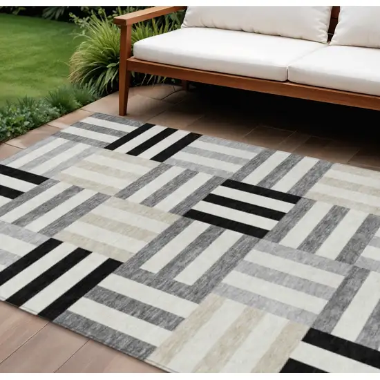 Black Beige And Ivory Geometric Washable Indoor Outdoor Area Rug Photo 1