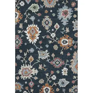 Photo of Black Blue And Ivory Floral Medallion Washable Area Rug With UV Protection