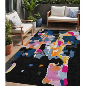 Photo of Black Blue And Pink Abstract Washable Indoor Outdoor Area Rug
