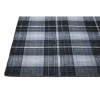 Photo of Black Blue And White Abstract Hand Woven Stain Resistant Area Rug