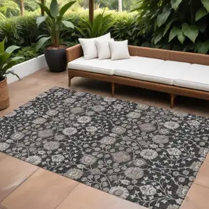 Photo of Black Brown And Beige Floral Washable Indoor Outdoor Area Rug