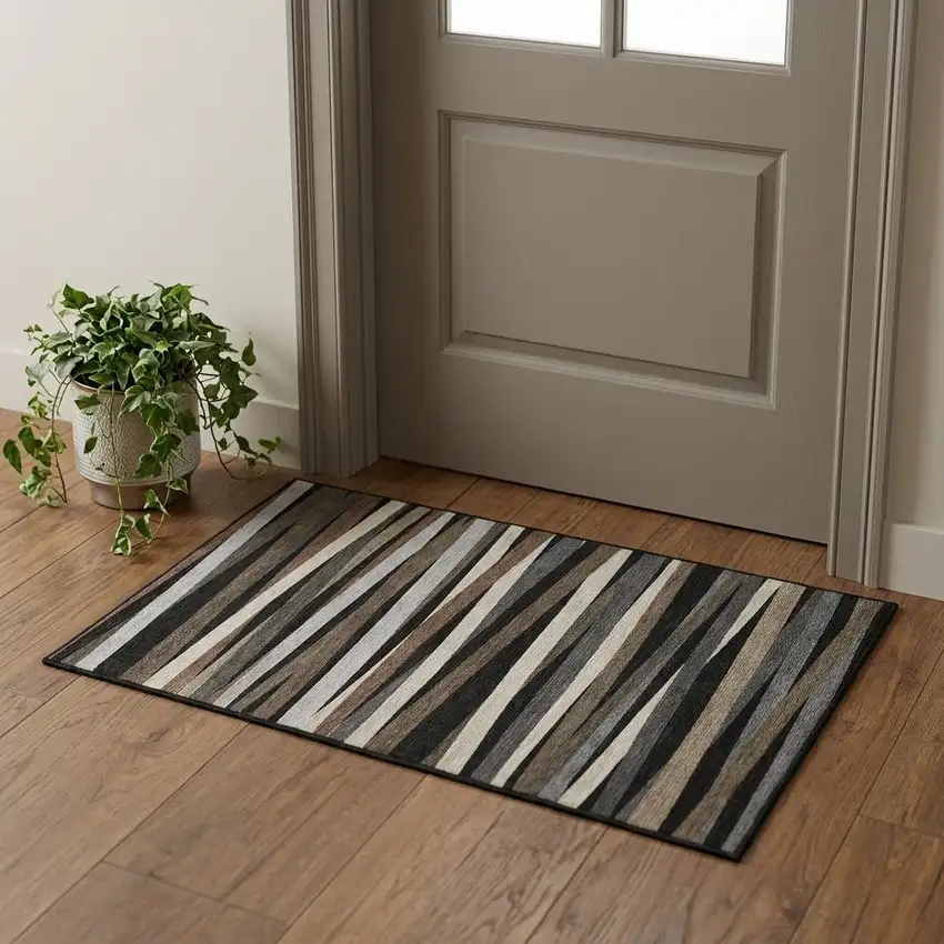 Black Brown And Ivory Striped Washable Area Rug With UV Protection Photo 1