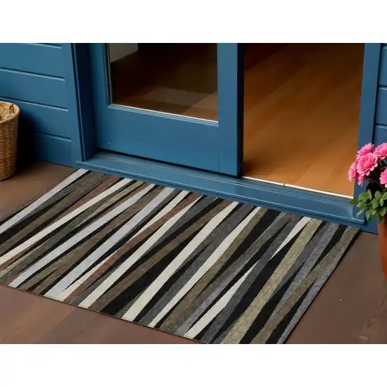 Black Brown And Ivory Striped Washable Indoor Outdoor Area Rug Photo 1