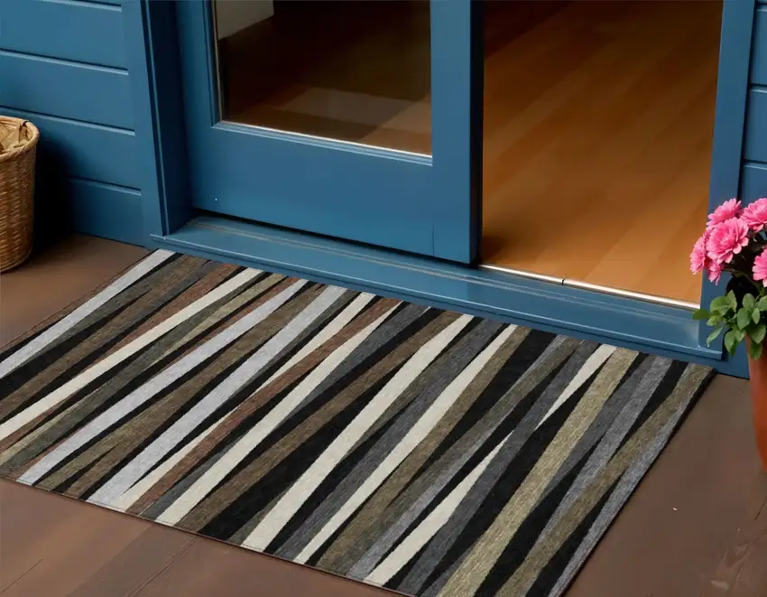Black Brown And Ivory Striped Washable Indoor Outdoor Area Rug Photo 1