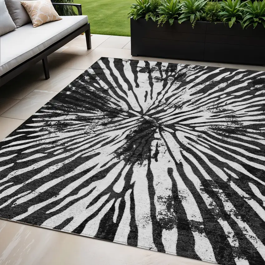 Black Charcoal And Ivory Abstract Washable Indoor Outdoor Area Rug Photo 1