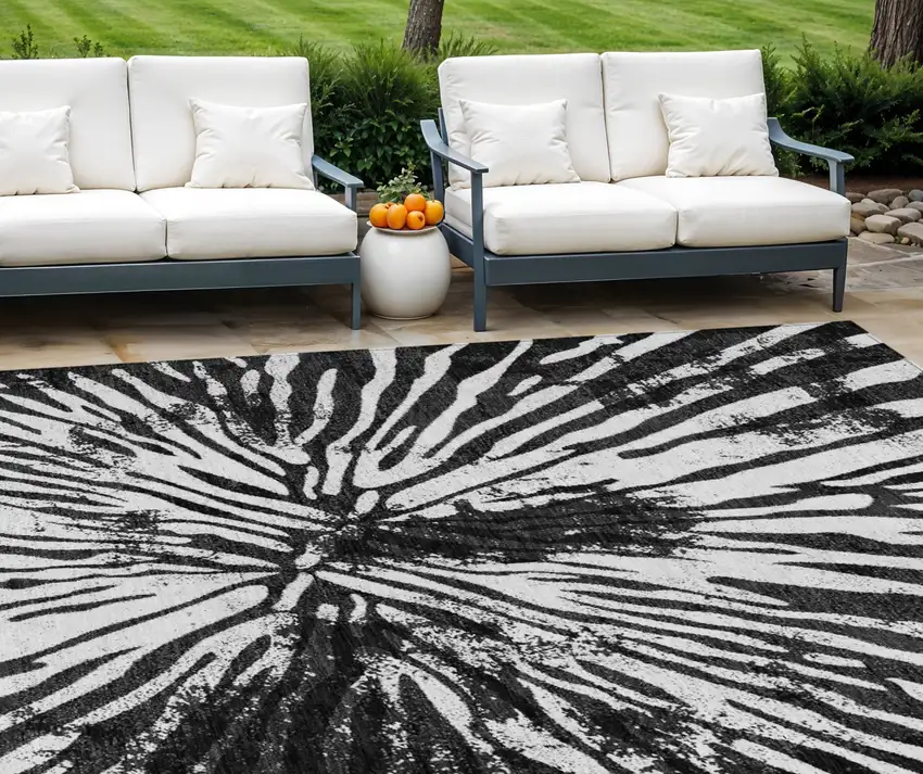 Black Charcoal And Ivory Abstract Washable Indoor Outdoor Area Rug Photo 1