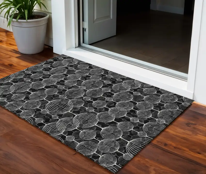 Black Charcoal And Ivory Geometric Washable Indoor Outdoor Area Rug Photo 1