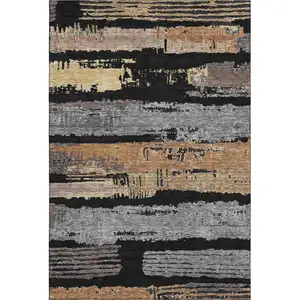 Photo of Black Copper And Gold Striped Washable Area Rug With UV Protection